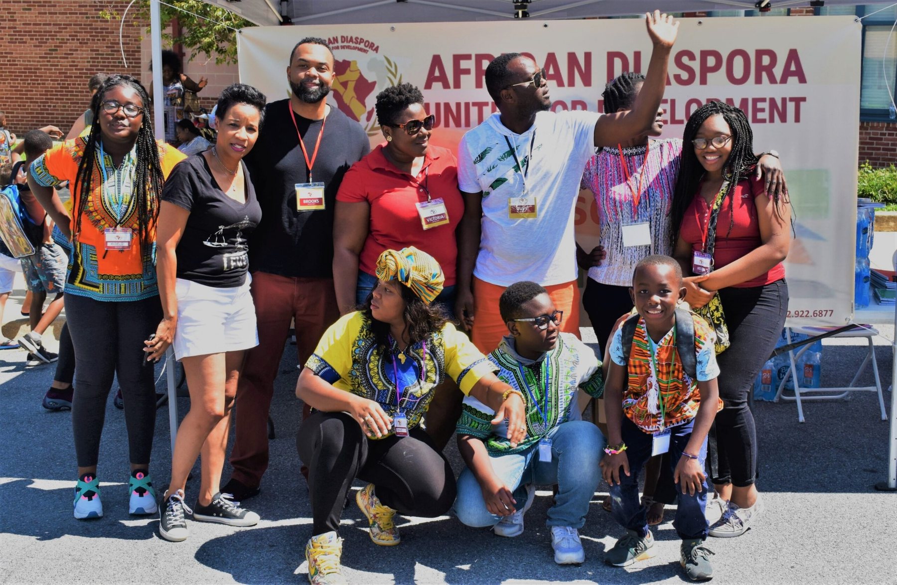 ADUD volunteers and team members gathered at a Back-to-School Backpack Bash event