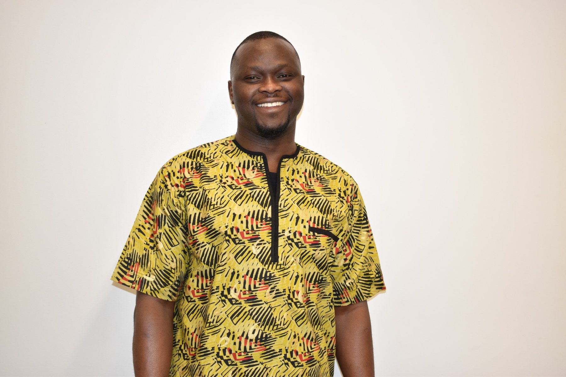 An Engage-Connect facilitator smiling against a neutral background